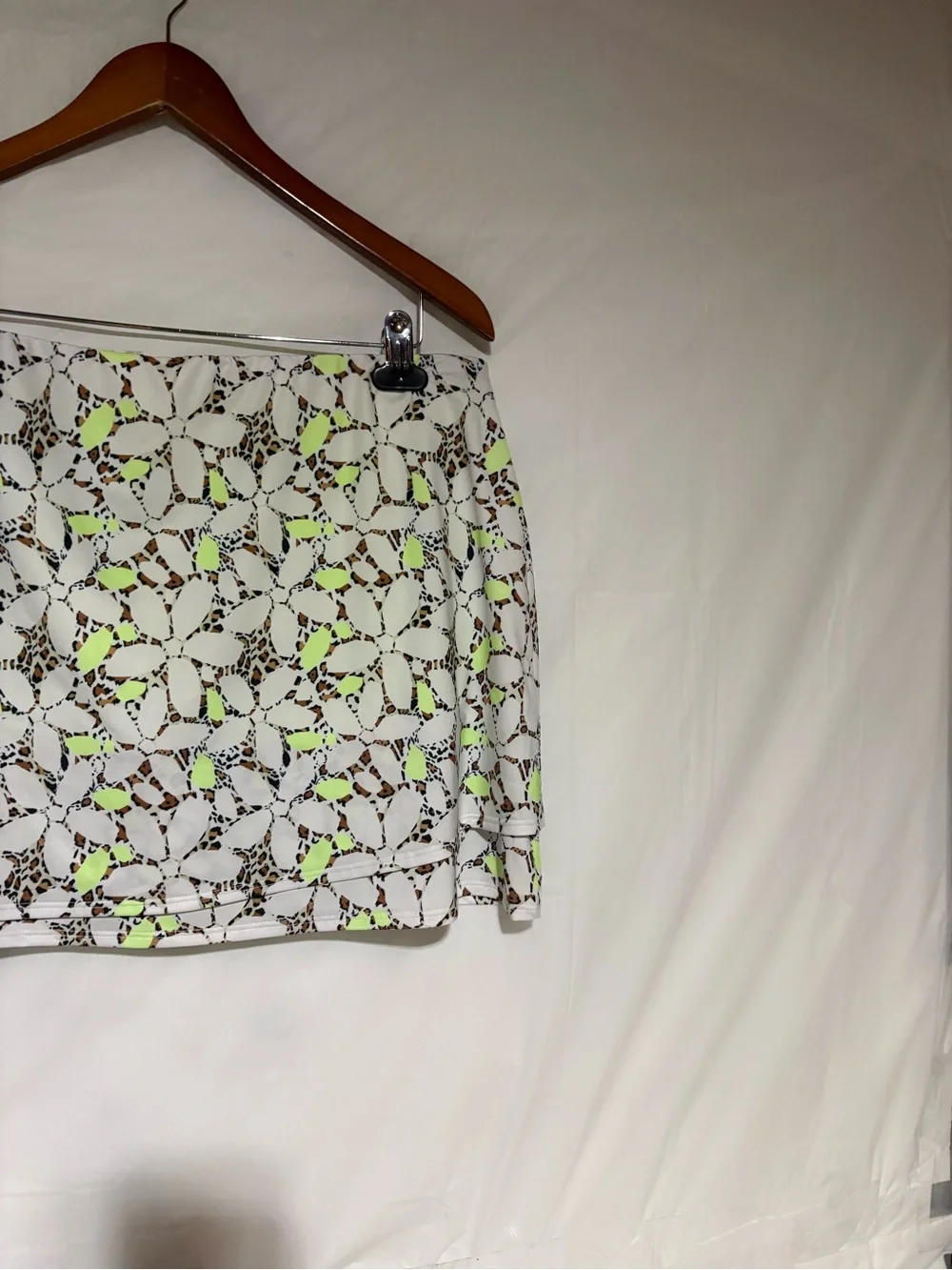 Cross court Floral Cutout Tennis Skort in White with Neon Yellow Accents